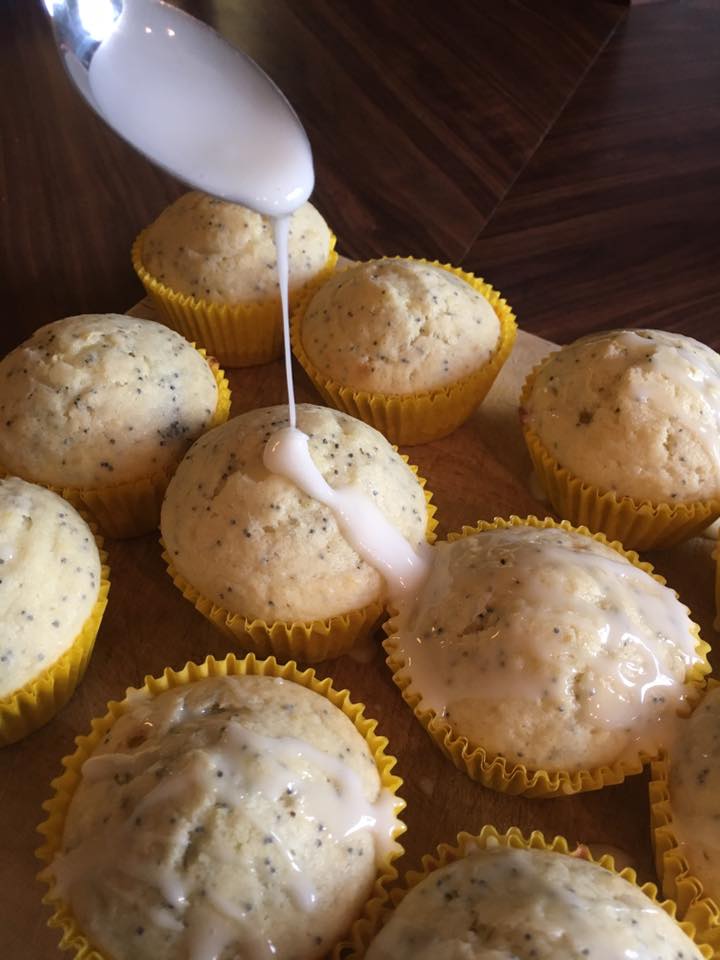 These Lemon Poppyseed Muffins are perfect for breakfast or brunch.  They're tangy and sweet, and the recipe is easy to make!  Don't forget to add the tangy lemon glaze for an added kick of citrus flavor!